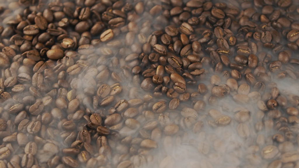 Coffee Beans spinning with white smoke - Bear Ridge Co.
